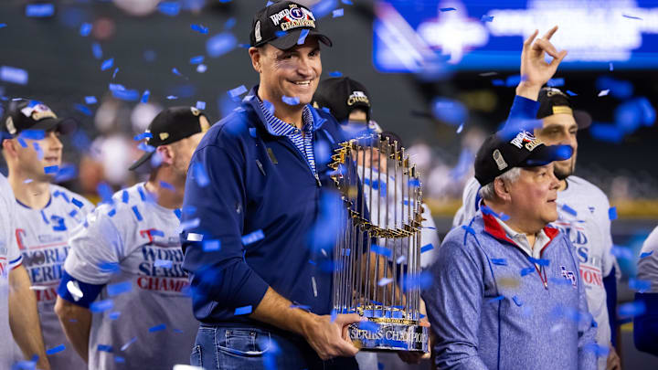 Nov 1, 2023; Phoenix, Arizona, USA; Texas Rangers general manager Chris Young celebrates with the trophy after winning the 2023 World Series in five game against the Arizona Diamondbacks at Chase Field. Mandatory Credit: Mark J. Rebilas-USA TODAY Sports