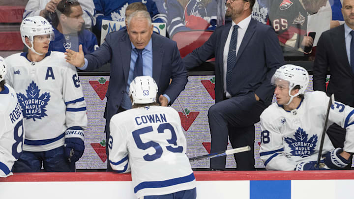 Sep 21st, 2025; Ottawa, Ontario, CAN; Toronto Maple Leafs head coach Craig Berube speaks with right wing Easton Cowan (53) in the third period against the Ottawa Senators at the Canadian Tire Centre. Mandatory Credit: Marc DesRosiers-IMAGN Images