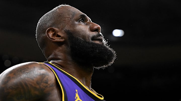 Mar 8, 2025; Boston, Massachusetts, USA; Los Angeles Lakers forward LeBron James (23) looks into the crowd during a timeout in the fourth quarter of a game against the Boston Celtics at the TD Garden. Mandatory Credit: Brian Fluharty-Imagn Images