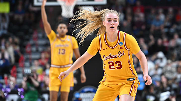 Mar 29, 2025; Spokane, WA, USA; USC Trojans guard Avery Howell (23) goes back on defense against the Kansas State Wildcats during the second half of a Sweet 16 NCAA Tournament basketball game against the Kansas State Wildcats at Spokane Arena. Mandatory Credit: James Snook-Imagn Images