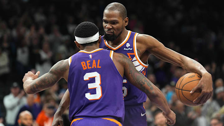 Jan 21, 2024; Phoenix, Arizona, USA; Phoenix Suns guard Bradley Beal (3) and Phoenix Suns forward Kevin Durant (35) hug during the second half of the game against the Indiana Pacers at Footprint Center. Mandatory Credit: Joe Camporeale-Imagn Images