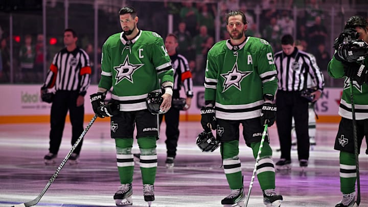 Sep 23, 2025; Dallas, Texas, USA; Dallas Stars left wing Jamie Benn (14) and center Tyler Seguin (91) look on before the game against the Minnesota Wild at American Airlines Center. Mandatory Credit: Jerome Miron-Imagn Images