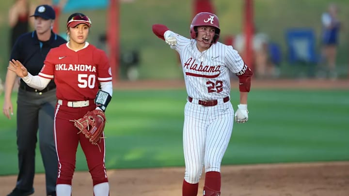 Alabama Softball Player Kali Heivilin (22) celebrates after play against Oklahoma at Rhoads Stadium in Tuscaloosa, AL on Monday, Apr 14, 2025. Alabama Softball Player Kali Heivilin (22) celebrates after play against Oklahoma at Rhoads Stadium in Tuscaloosa, AL on Monday, Apr 14, 2025.