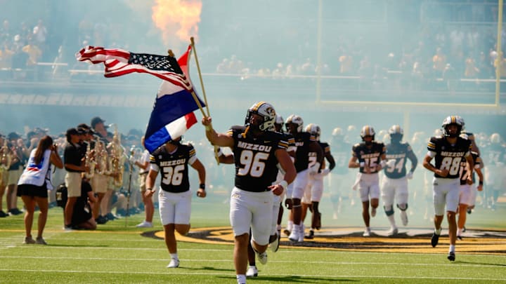Sept 13, 2025; Columbia, Missouri, USA; Missouri Tigers defensive end Aidan Dubbert leads the team on the field ahead of their game against Louisiana at Faurot Field