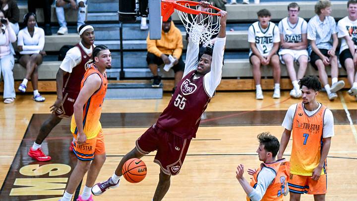 Team Faygo and Michigan State's Jasiah Jervis gets the put-back dunk against Team Tri-Star during the Moneyball Pro-Am on Thursday, June 25, 2026, at Holt High School.
