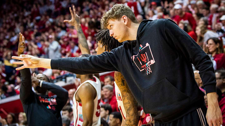 Indiana's Logan Duncomb (51) and the Indiana bench celebrate a Miller Kopp three-pointer during the second half of the Indiana versus Rutgers men's basketball game at Simon Skjodt Assembly Hall on Tuesday, Feb. 7, 2023.
Iu Ru Mbb 2h Duncan 1 Indiana's Logan Duncomb (51) and the Indiana bench celebrate a Miller Kopp three-pointer during the second half of the Indiana versus Rutgers men's basketball game at Simon Skjodt Assembly Hall on Tuesday, Feb. 7, 2023.
Iu Ru Mbb 2h Duncan 1