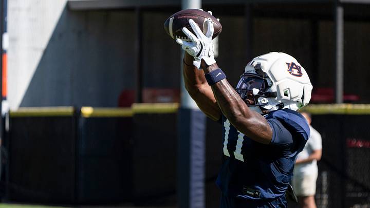 Auburn Tigers wide receiver Keshaun Singleton (11) catches a pass during Auburn football practice at Woltosz Football Performance Center in Auburn, Ala. on Saturday, Aug. 8, 2026.