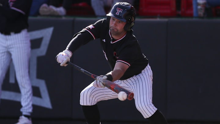 Texas Tech's Tracer Lopez attempts to bunt against UAlbany during a non-conference baseball game, Friday, Feb. 20, 2026, at Rip Griffin Park. Texas Tech's Tracer Lopez attempts to bunt against UAlbany during a non-conference baseball game, Friday, Feb. 20, 2026, at Rip Griffin Park.