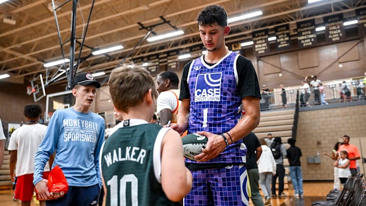 Michigan State's Frankie Fidler signs autographs for fans on Thursday, June 27, 2024, during the Moneyball Pro-Am at Holt High School.