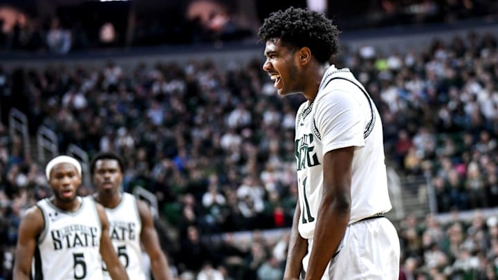 Michigan State's Jase Richardson gets excited after his teammate Szymon Zapala dunks and draws a foul during the first half in the game against Florida Atlantic on Saturday, Dec. 21, 2024, in East Lansing.