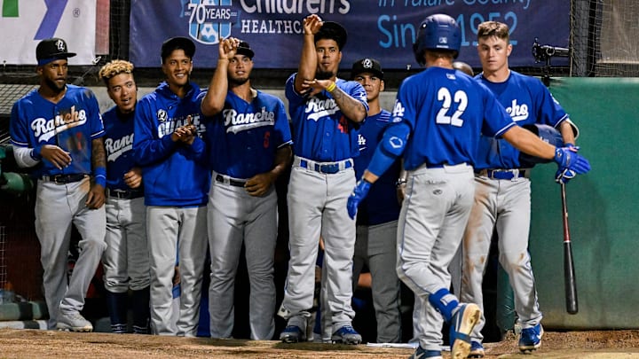 Teammates celebrate Rancho Cucamonga's Damon Keith's home run against Visalia Rawhide on Friday, April 8 on Opening Night at Valley Strong Stadium.