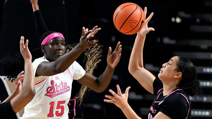 Mississippi State center Madina Okot (15) and Vanderbilt forward Khamil Pierre (12) battle for the ball during a NCAA college basketball game Thursday, Feb. 13, 2025, in Nashville, Tenn.