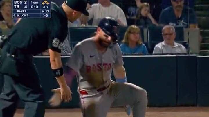 Trevor Story and Chris Segal shared a high five after Story slid safely into home.