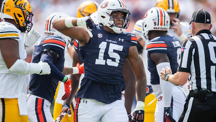 Auburn Tigers defensive lineman Keldric Faulk celebrates a stop as Auburn Tigers take on California Golden Bears.