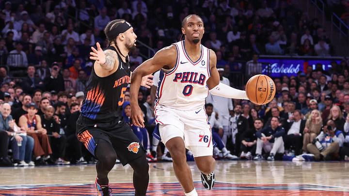 May 6, 2026; New York, New York, USA; Philadelphia 76ers guard Tyrese Maxey (0) drives past New York Knicks guard Jose Alvarado (5) during game five of the second round of the 2026 NBA Playoffs at Madison Square Garden. Mandatory Credit: Wendell Cruz-Imagn Images