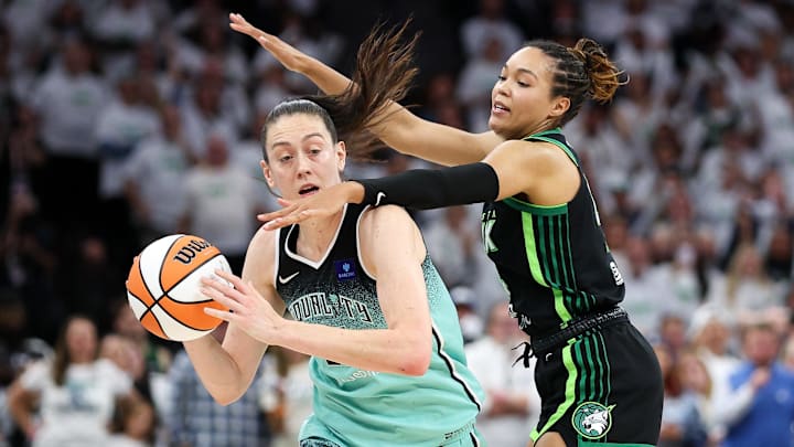Oct 16, 2024; Minneapolis, Minnesota, USA; Minnesota Lynx forward Napheesa Collier (24) defends against New York Liberty forward Breanna Stewart (30) during the second half of game three of the 2024 WNBA Finals at Target Center. Mandatory Credit: Matt Krohn-Imagn Images