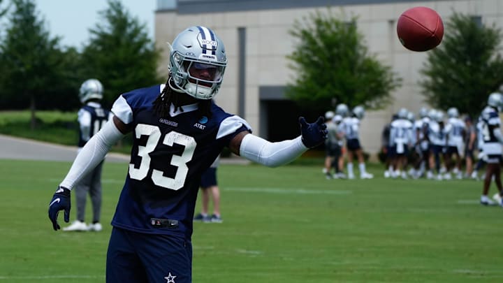 Dallas Cowboys safety Julius Wood goes through a drill during practice at the Ford Center.