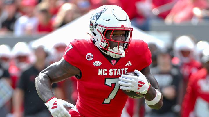 Nov 2, 2024; Raleigh, North Carolina, USA; North Carolina State Wolfpack saftey Bishop Fitzgerald (7) runs the ball during the first quarter against Stanford Cardinals at Carter-Finley Stadium. Mandatory Credit: Zachary Taft-Imagn Images Nov 2, 2024; Raleigh, North Carolina, USA; North Carolina State Wolfpack saftey Bishop Fitzgerald (7) runs the ball during the first quarter against Stanford Cardinals at Carter-Finley Stadium. Mandatory Credit: Zachary Taft-Imagn Images