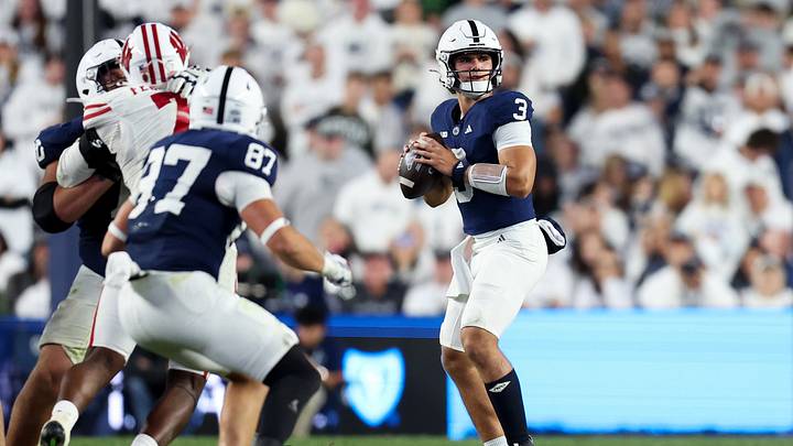 Penn State Nittany Lions quarterback Rocco Becht looks to throw a pass against the Wisconsin Badgers at Beaver Stadium. Penn State Nittany Lions quarterback Rocco Becht looks to throw a pass against the Wisconsin Badgers at Beaver Stadium.