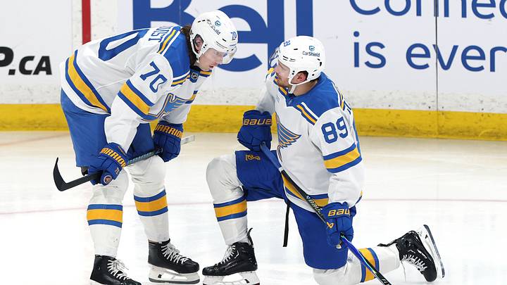 Mar 15, 2026; Winnipeg, Manitoba, CAN; St. Louis Blues center Oskar Sundqvist (70) and St. Louis Blues left wing Pavel Buchnevich (89) talk before the start of the third period against the Winnipeg Jets at Canada Life Centre. Mandatory Credit: James Carey Lauder-Imagn Images Mar 15, 2026; Winnipeg, Manitoba, CAN; St. Louis Blues center Oskar Sundqvist (70) and St. Louis Blues left wing Pavel Buchnevich (89) talk before the start of the third period against the Winnipeg Jets at Canada Life Centre. Mandatory Credit: James Carey Lauder-Imagn Images
