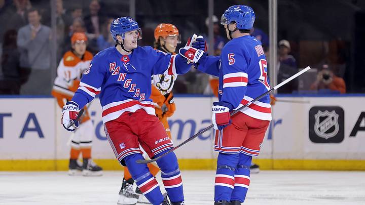 Oct 19, 2026; New York, New York, USA; New York Rangers defenseman Sean Durzi (5) celebrates his goal against the Anaheim Ducks with right wing Pavel Dorofeyev (16) during the first period at Madison Square Garden. Mandatory Credit: Brad Penner-Imagn Images Oct 19, 2026; New York, New York, USA; New York Rangers defenseman Sean Durzi (5) celebrates his goal against the Anaheim Ducks with right wing Pavel Dorofeyev (16) during the first period at Madison Square Garden. Mandatory Credit: Brad Penner-Imagn Images