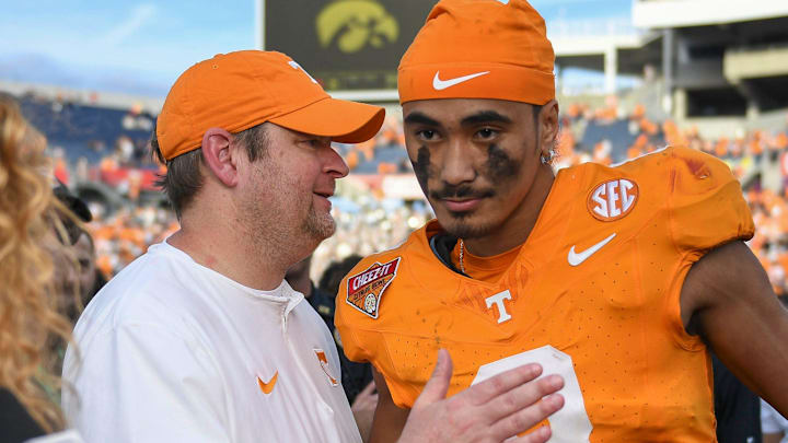 Tennessee head coach Josh Heupel turns to quarterback Nico Iamaleava (8) after their post game interview after winning the Citrus Bowl NCAA College football game on Monday, January 1, 2024 in Orlando, Fla. against Iowa.