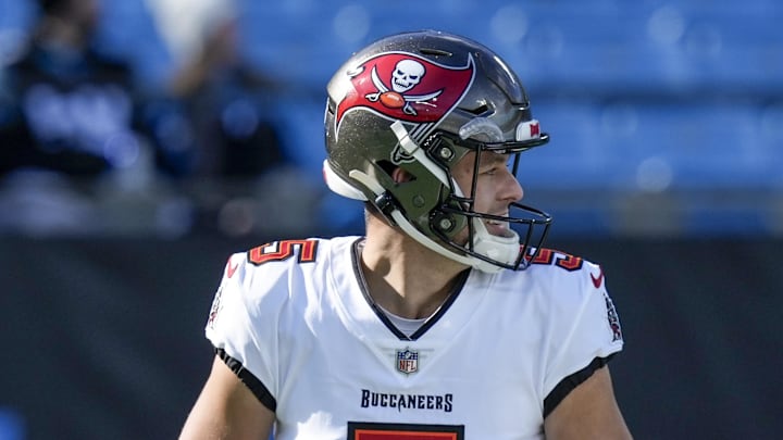 Jan 7, 2024; Charlotte, North Carolina, USA; Tampa Bay Buccaneers punter Jake Camarda (5) and place kicker Chase McLaughlin (4) during pregame warm ups against the Carolina Panthers at Bank of America Stadium. Mandatory Credit: Jim Dedmon-Imagn Images
