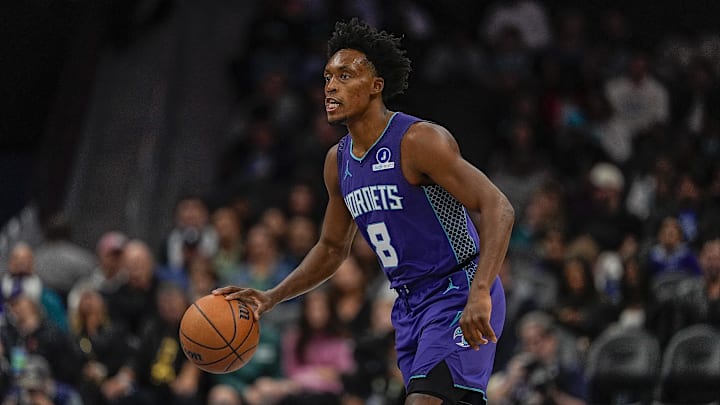 Nov 2, 2025; Charlotte, North Carolina, USA; Charlotte Hornets guard Collin Sexton (8) brings the ball up court against the Utah Jazz during the first quarter at Spectrum Center. Mandatory Credit: Jim Dedmon-Imagn Images
