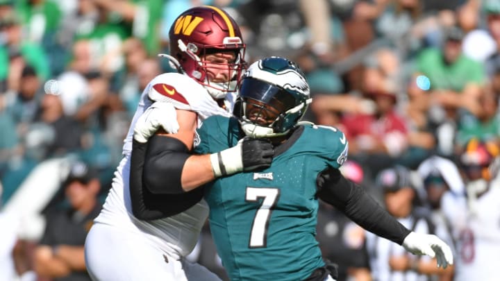 Oct 1, 2023; Philadelphia, Pennsylvania, USA; Philadelphia Eagles linebacker Haason Reddick (7) is blocked by Washington Commanders guard Andrew Wylie (71) at Lincoln Financial Field. Mandatory Credit: Eric Hartline-USA TODAY Sports