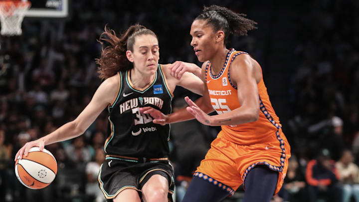 Sep 24, 2023; Brooklyn, New York, USA; New York Liberty forward Breanna Stewart (30) looks to drive past Connecticut Sun forward Alyssa Thomas (25) in the third quarter during game one of the 2023 WNBA Playoffs at Barclays Center. Mandatory Credit: Wendell Cruz-Imagn Images