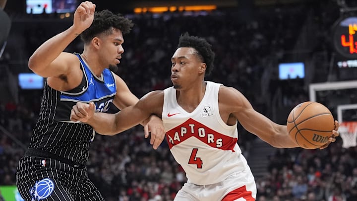 Dec 29, 2025; Toronto, Ontario, CAN; Toronto Raptors guard Scottie Barnes (4) blocks tries to get around Orlando Magic forward Noah Penda (93) during the first half at Scotiabank Arena. Mandatory Credit: John E. Sokolowski-Imagn Images Dec 29, 2025; Toronto, Ontario, CAN; Toronto Raptors guard Scottie Barnes (4) blocks tries to get around Orlando Magic forward Noah Penda (93) during the first half at Scotiabank Arena. Mandatory Credit: John E. Sokolowski-Imagn Images