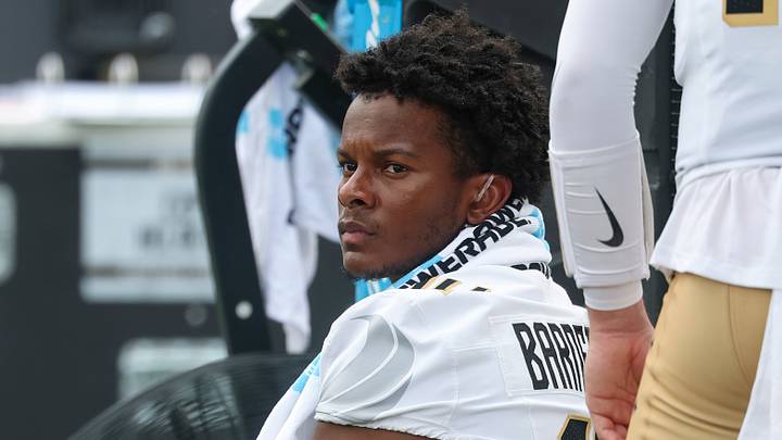 Oct 3, 2026; Houston, Texas, USA; UCF Knights quarterback Alonza Barnett III (14) sits on the sideline during the fourth quarter against the Houston Cougars at TDECU Stadium. Mandatory Credit: Troy Taormina-Imagn Images Oct 3, 2026; Houston, Texas, USA; UCF Knights quarterback Alonza Barnett III (14) sits on the sideline during the fourth quarter against the Houston Cougars at TDECU Stadium. Mandatory Credit: Troy Taormina-Imagn Images