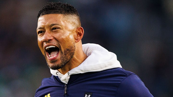 Notre Dame head coach Marcus Freeman celebrates a turnover during a NCAA college football game against Virginia at Notre Dame Stadium on Saturday, Nov. 16, 2024, in South Bend.
