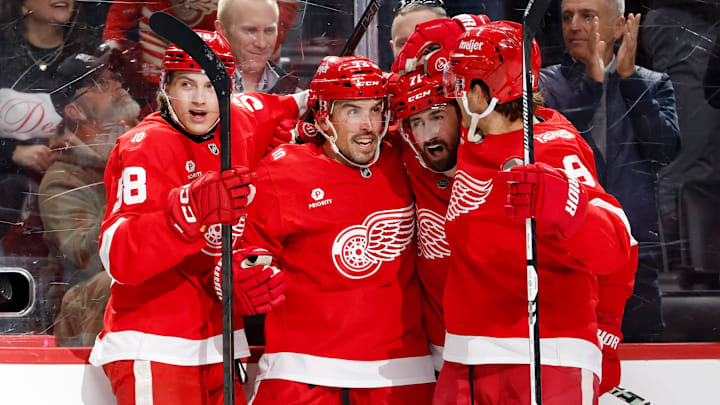 Apr 7, 2026; Detroit, Michigan, USA; Detroit Red Wings defenseman Justin Faulk (72) receives congratulations from teammates after scoring in the second period against the Columbus Blue Jackets at Little Caesars Arena. Mandatory Credit: Rick Osentoski-Imagn Images Apr 7, 2026; Detroit, Michigan, USA; Detroit Red Wings defenseman Justin Faulk (72) receives congratulations from teammates after scoring in the second period against the Columbus Blue Jackets at Little Caesars Arena. Mandatory Credit: Rick Osentoski-Imagn Images