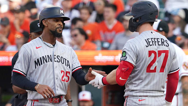 Mar 26, 2026; Baltimore, Maryland, USA; Minnesota Twins outfielder Byron Buxton (25) greeted by catcher Ryan Jeffers (27) after scoring a run during the eighth inning against the Baltimore Orioles at Oriole Park at Camden Yards.
