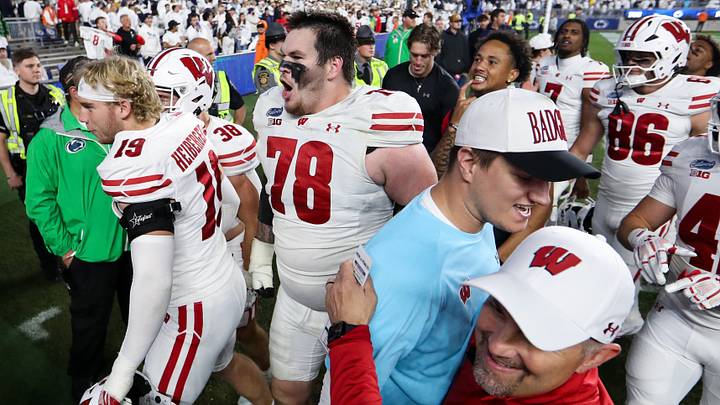 Sep 26, 2026; University Park, Pennsylvania, USA;  Wisconsin Badgers offensive lineman Colin Cubberly (78) reacts while exiting the field following the game against the Penn State Nittany Lions at West Shore Home Field at Beaver Stadium.  Mandatory Credit: Matthew O'Haren-Imagn Images