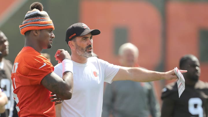 Browns quarterback Deshaun Watson talks with head coach Kevin Stefanski during a workout, Wednesday,