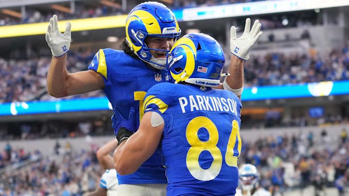 Dec 14, 2025; Inglewood, California, USA; Los Angeles Rams wide receiver Puka Nacua (12) and Los Angeles Rams tight end Colby Parkinson (84) celebrate after a touchdown during the third quarter against the Detroit Lions at SoFi Stadium. Mandatory Credit: Kirby Lee-Imagn Images