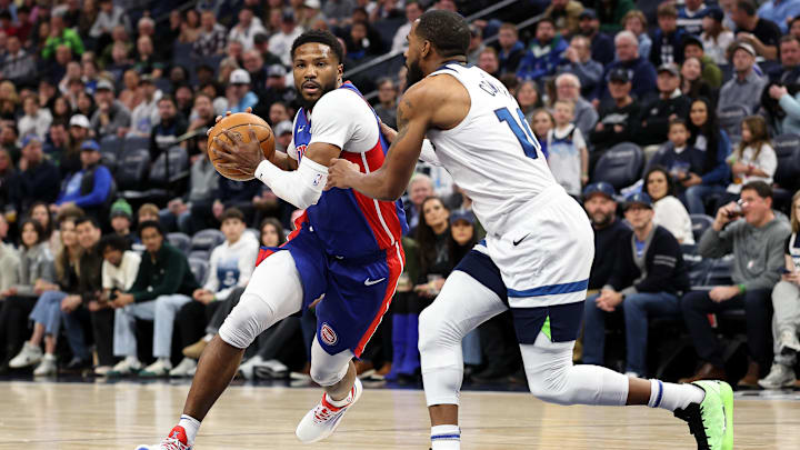 Detroit Pistons guard Malik Beasley drives towards the basket as Minnesota Timberwolves guard Mike Conley defends during the first quarter at Target Center in Minneapolis on March 30, 2025. Detroit Pistons guard Malik Beasley drives towards the basket as Minnesota Timberwolves guard Mike Conley defends during the first quarter at Target Center in Minneapolis on March 30, 2025.