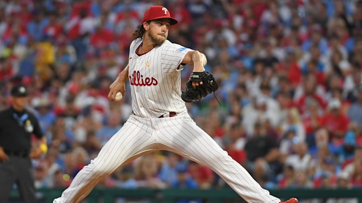 Sep 1, 2024; Philadelphia, Pennsylvania, USA; Philadelphia Phillies pitcher Aaron Nola (27) throws a pitch during the second inning against the Atlanta Braves at Citizens Bank Park. Mandatory Credit: Eric Hartline-Imagn Images