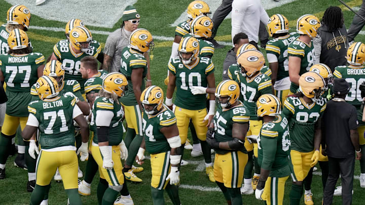 Green Bay Packers quarterback Jordan Love (10) gathers his teammates before their game against the Detroit Lions on Sunday.