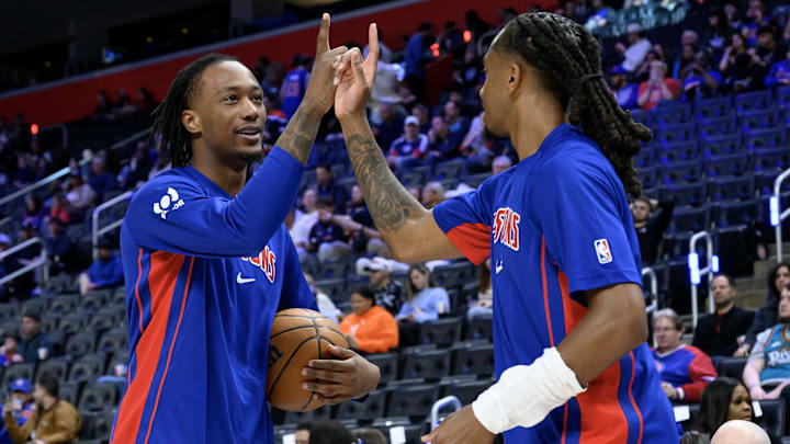 Mar 12, 2026; Detroit, Michigan, USA;  Detroit Pistons forward Ronald Holland II (left) and guard Daniss Jenkins work on their own custom handshake before their game against the Philadelphia 76ers at Little Caesars Arena. Mandatory Credit: Lon Horwedel-Imagn Images