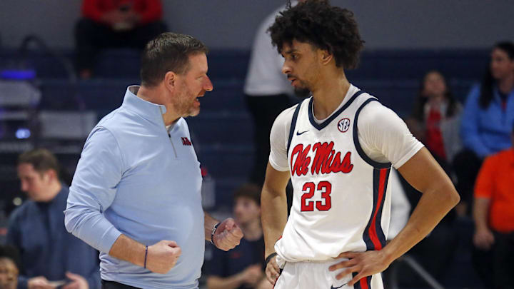 Feb 21, 2026; Oxford, Mississippi, USA; Mississippi Rebels head coach Chris Beard talks with guard Patton Pinkins (23) during the second half against the Florida Gators at The Sandy and John Black Pavilion at Ole Miss. Mandatory Credit: Petre Thomas-Imagn Images