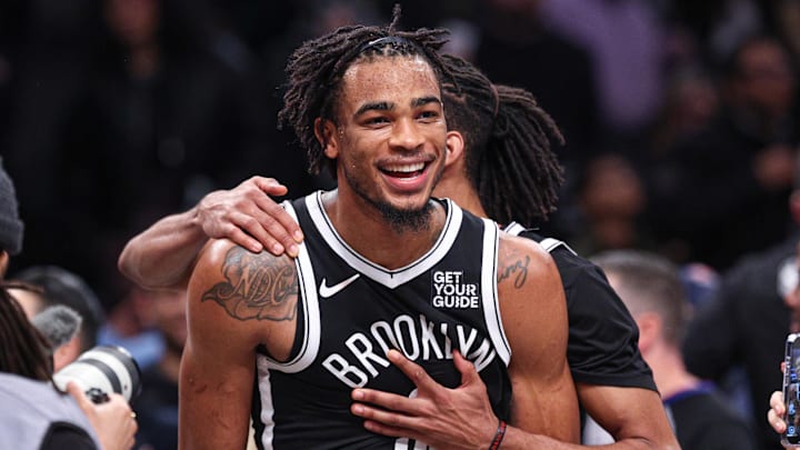 Feb 7, 2025; Brooklyn, New York, USA; Brooklyn Nets center Nic Claxton (33) celebrates with teammates after defeating the Miami Heat at Barclays Center. Mandatory Credit: Vincent Carchietta-Imagn Images Feb 7, 2025; Brooklyn, New York, USA; Brooklyn Nets center Nic Claxton (33) celebrates with teammates after defeating the Miami Heat at Barclays Center. Mandatory Credit: Vincent Carchietta-Imagn Images