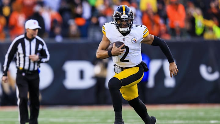 Dec 1, 2024; Cincinnati, Ohio, USA; Pittsburgh Steelers quarterback Justin Fields (2) runs with the ball against the Cincinnati Bengals in the second half at Paycor Stadium. Mandatory Credit: Katie Stratman-Imagn Images