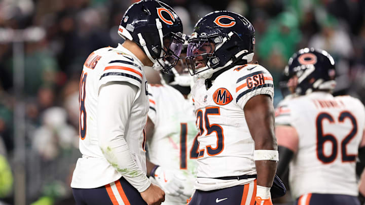 Nov 28, 2025; Philadelphia, Pennsylvania, USA; Chicago Bears quarterback Caleb Williams (18) and running back Kyle Monangai (25) celebrate after scoring a touchdown against the Philadelphia Eagles during the fourth quarter  of the game at Lincoln Financial Field. Mandatory Credit: Bill Streicher-Imagn Images