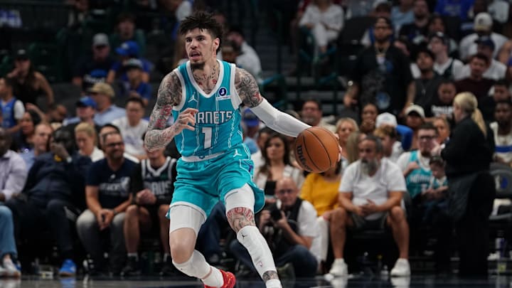 Oct 11, 2025; Dallas, Texas, USA; Charlotte Hornets guard Lamelo Ball (1) brings the ball up court against the Dallas Mavericks in the first half of a game at American Airlines Center. Mandatory Credit: Raymond Carlin III-Imagn Images