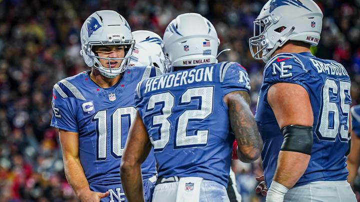 Nov 13, 2025; Foxborough, Massachusetts, USA; New England Patriots quarterback Drake Maye (10) congratulates running back Treveyon Henderson (32) after his touchdown against the New York Jets in the second quarter at Gillette Stadium. Mandatory Credit: David Butler II-Imagn Images
