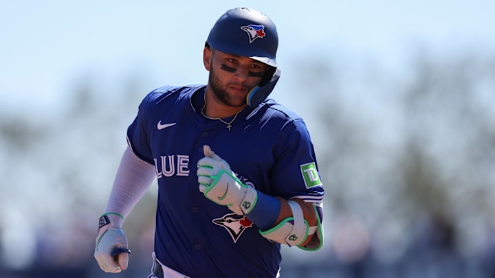 Mar 2, 2025; Dunedin, Florida, USA; Toronto Blue Jays shortstop Bo Bichette (11) runs the bases after hitting a home run against the Philadelphia Phillies in the third inning during spring training at TD Ballpark. Mar 2, 2025; Dunedin, Florida, USA; Toronto Blue Jays shortstop Bo Bichette (11) runs the bases after hitting a home run against the Philadelphia Phillies in the third inning during spring training at TD Ballpark.