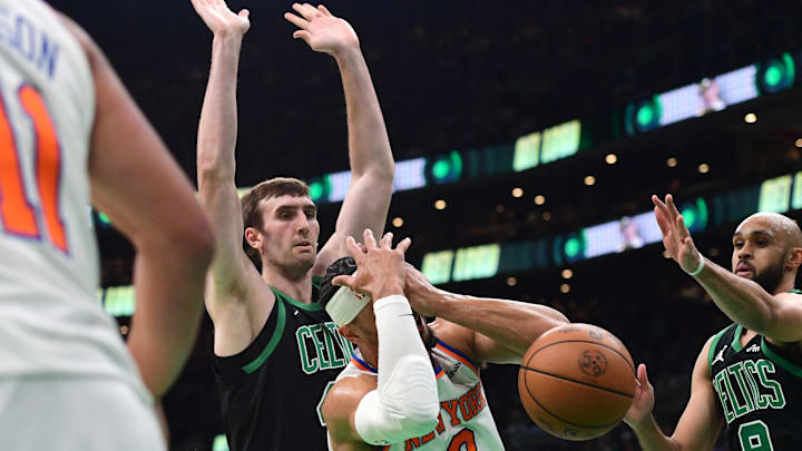 
May 14, 2025; Boston, Massachusetts, USA; New York Knicks guard Josh Hart (3) gets an elbow in the eye from Boston Celtics center Luke Kornet (40) in the first half during game five of the second round for the 2025 NBA Playoffs at TD Garden. Mandatory Credit: Bob DeChiara-Imagn Images